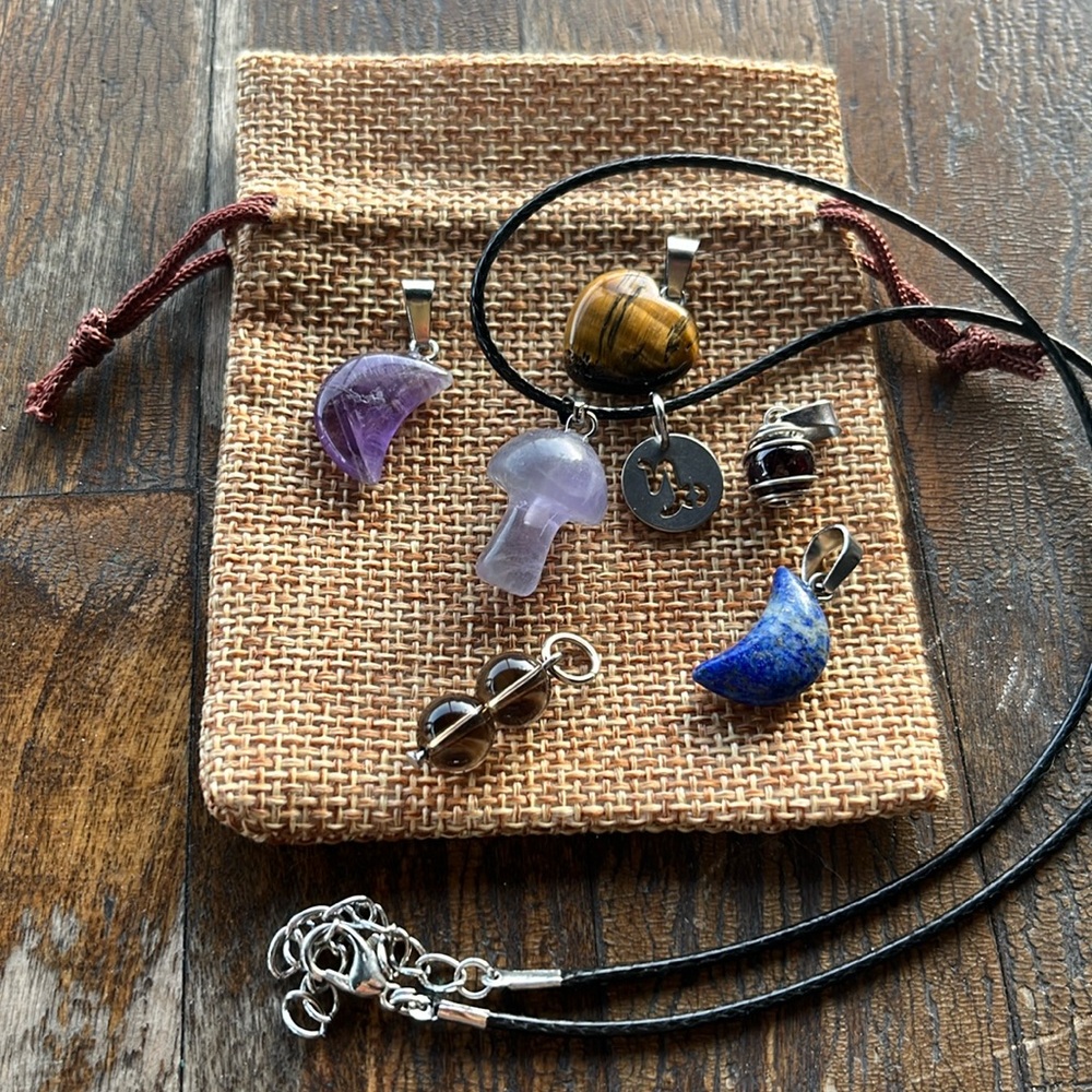 Crystals for Capricorn! Fluorite Garnet Lapis Lazuli Amethyst Tigers Eye Smoky
